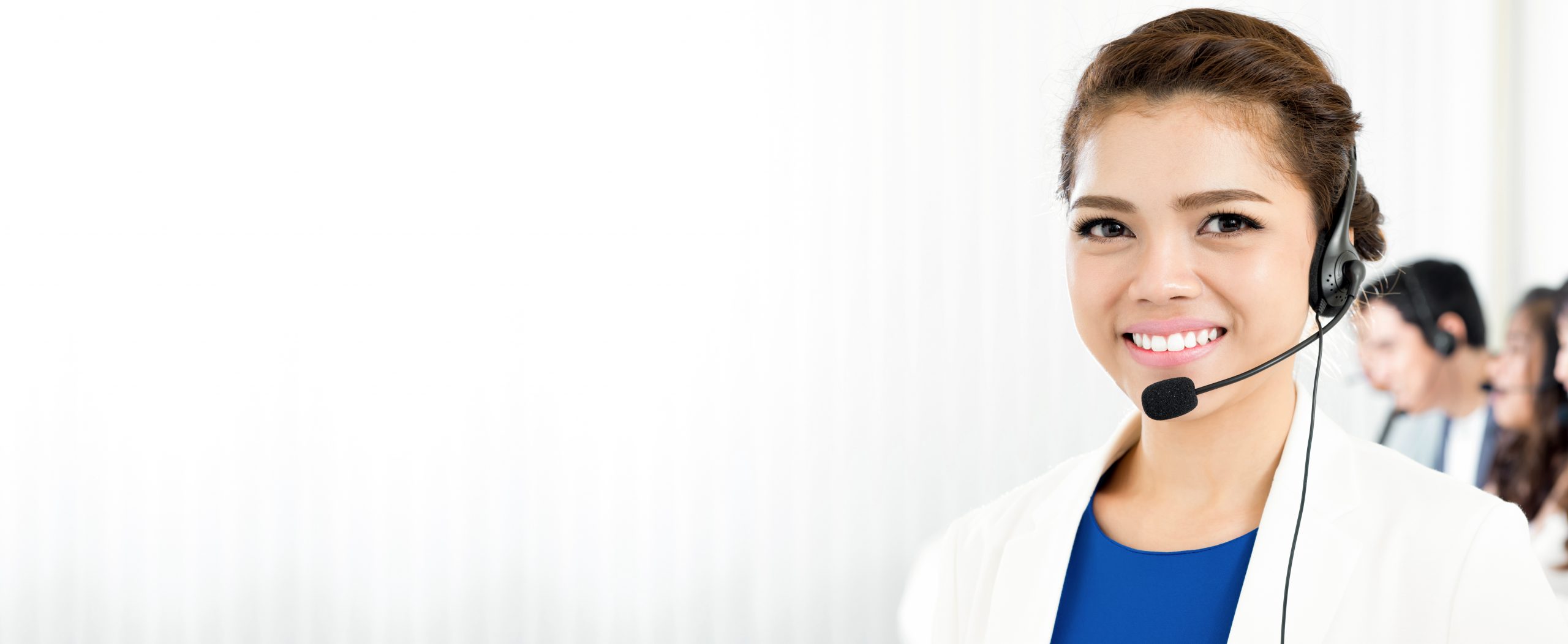 Smiling,Woman,Wearing,Microphone,Headset,As,An,Operator,,Telemarketer,,Call
